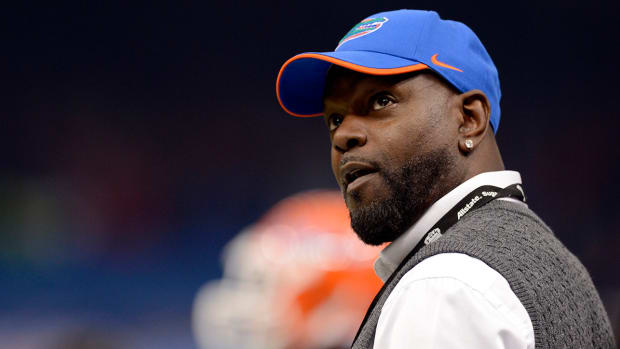 Former Florida and Dallas Cowboys former running back Emmitt Smith watches the Sugar Bowl from the sidelines during the first quarter at the Mercedes-Benz Superdome.